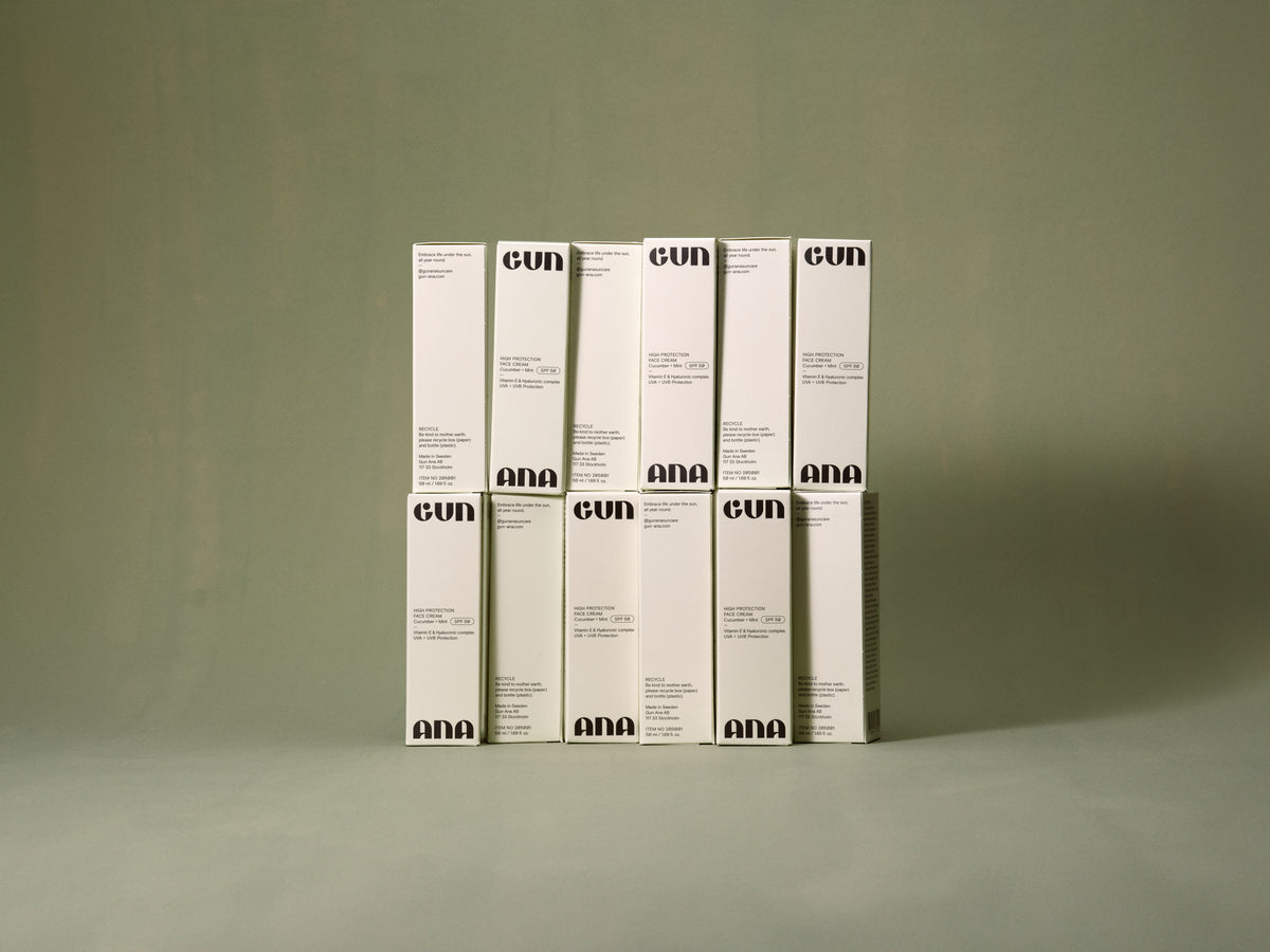 Four Gun Ana skincare boxes arranged in a row