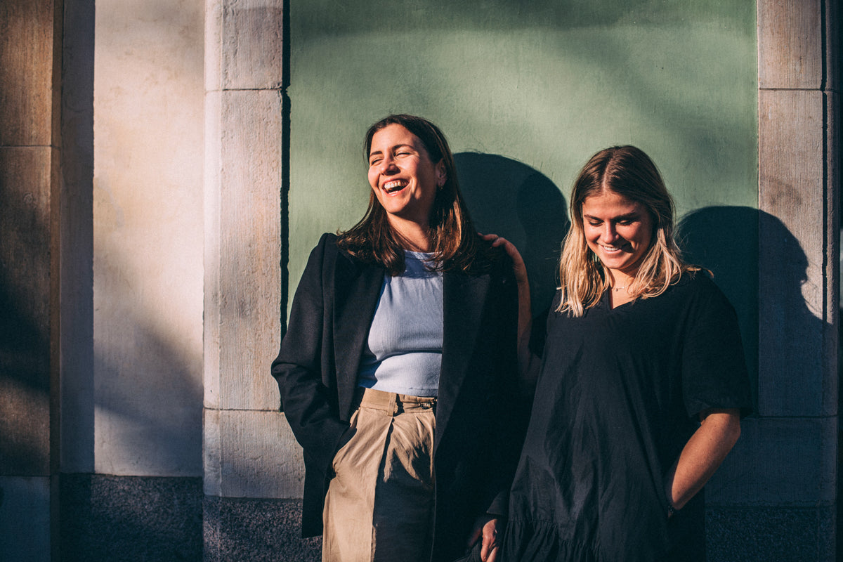 Gun Ana founders Sigrid Osvald and Kajsa Regnér outside a building